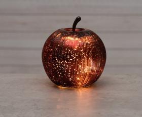 R&ouml;tt glas&auml;pple med LED-ljus