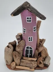 Ett hus i drivved (Rosa)