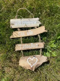 Mobil i drivved "V&auml;lkommen till v&aring;r tr&auml;dg&aring;rd"